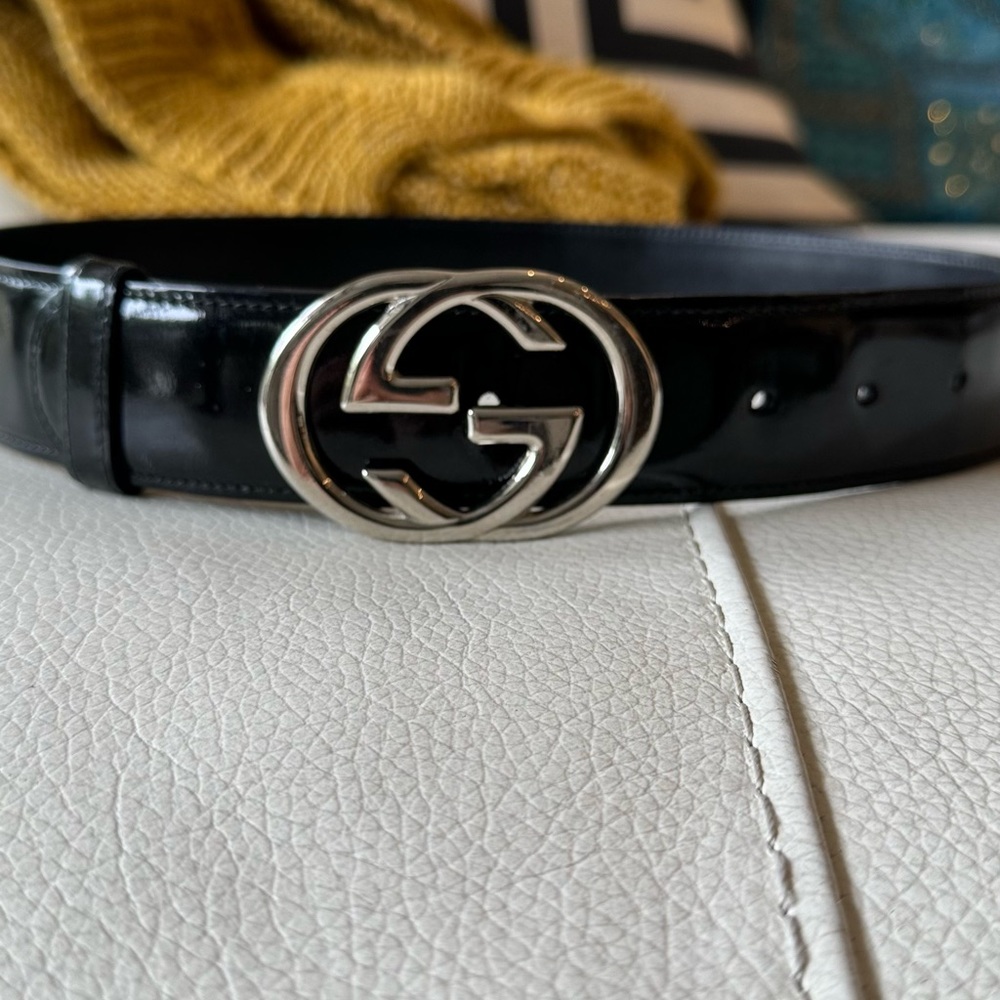 Vintage Gucci black patent leather belt with one extra hole to make it smaller.